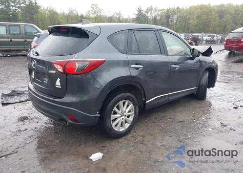 2014 Mazda Cx-5 Touring from USA, damaged, VIN JM3KE2CY3E0317437